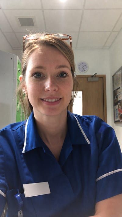 Emilie in her NHS children's nurse uniform